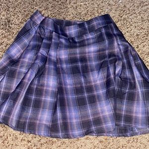 purple and black pleated skirt